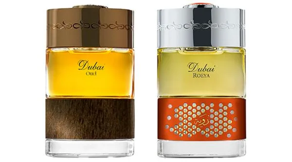 A split image showing a traditional ornate bottle on one side and a modern luxury bottle on the other