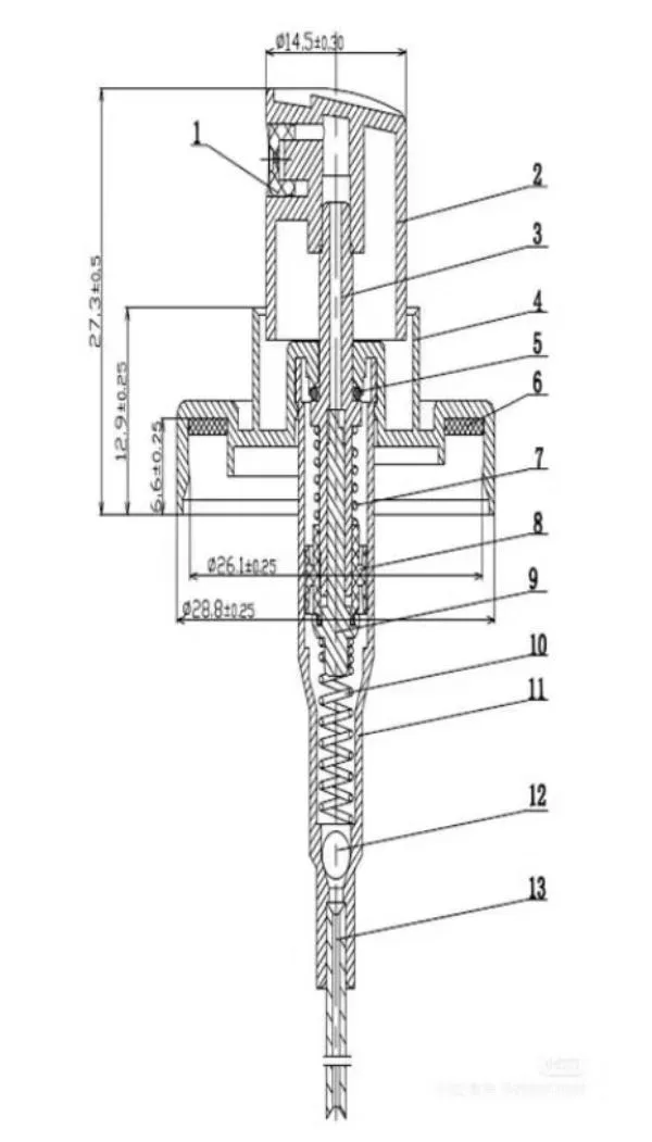 A close-up of a perfume spray pump mechanism showing its components