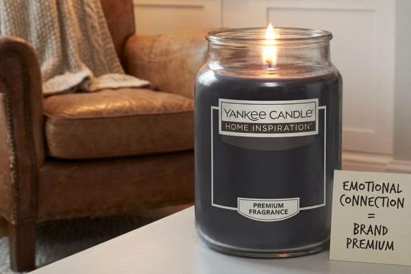 A Yankee Candle displayed in a cozy home setting.