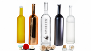 Glass bottles showing color spray, electroplating, screen printing and frosting finishes side by side