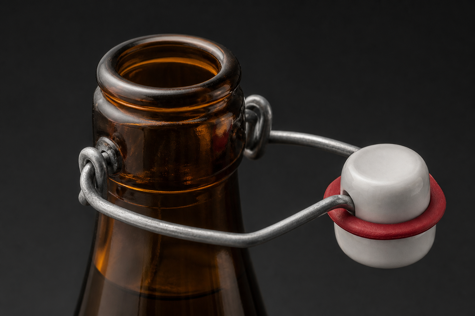 Swing top closure with ceramic stopper, rubber gasket and wire bail on a glass beer bottle